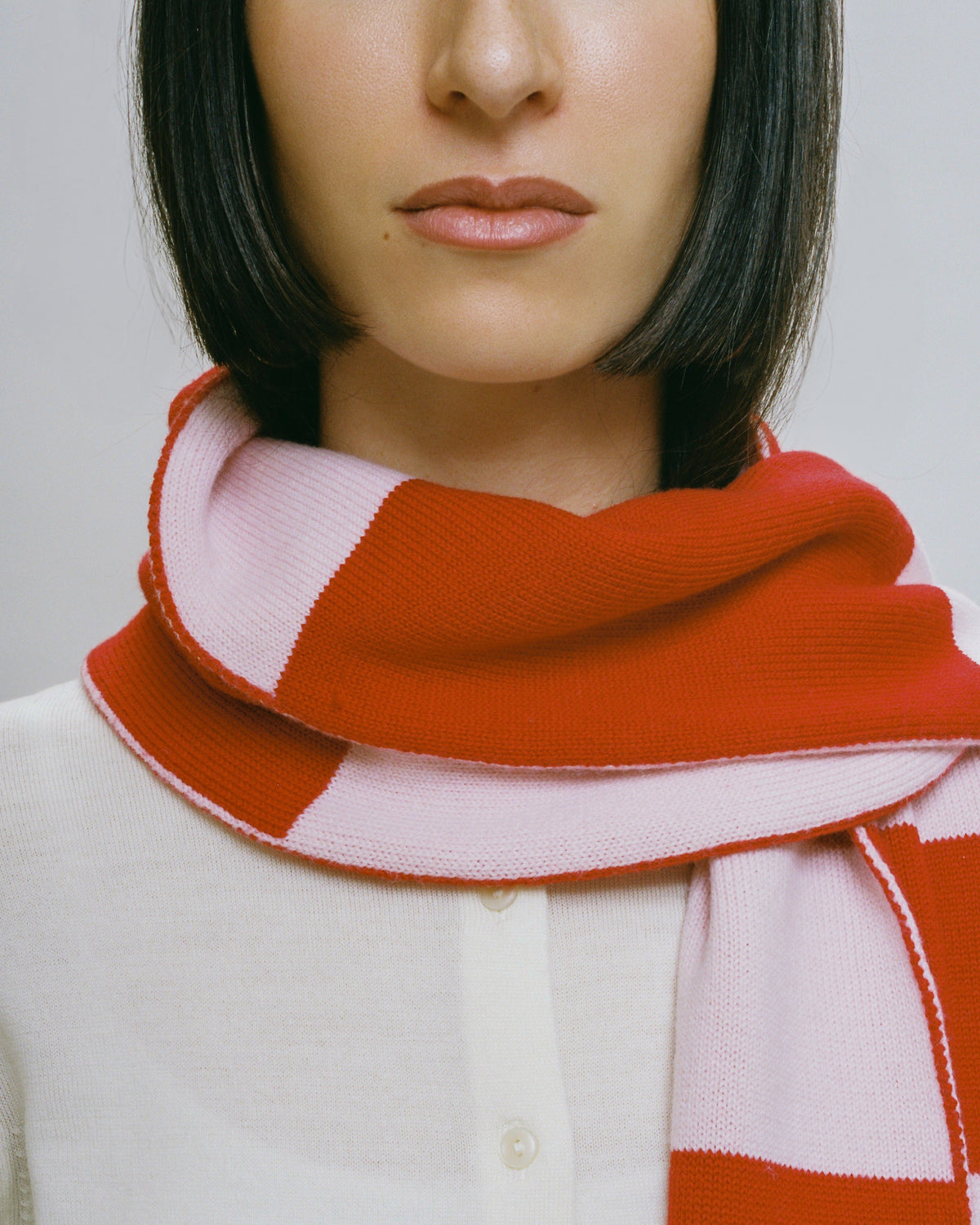 Eloisa scarf worn, red and dusty pink Merino wool