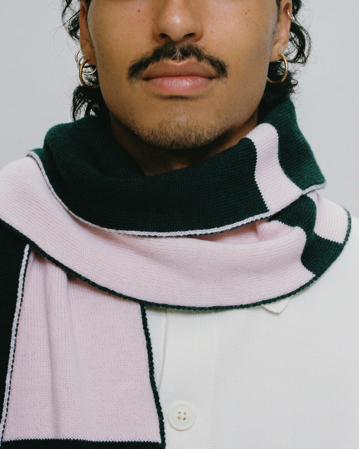 Amora scarf worn, dark green and pale pink Merino wool