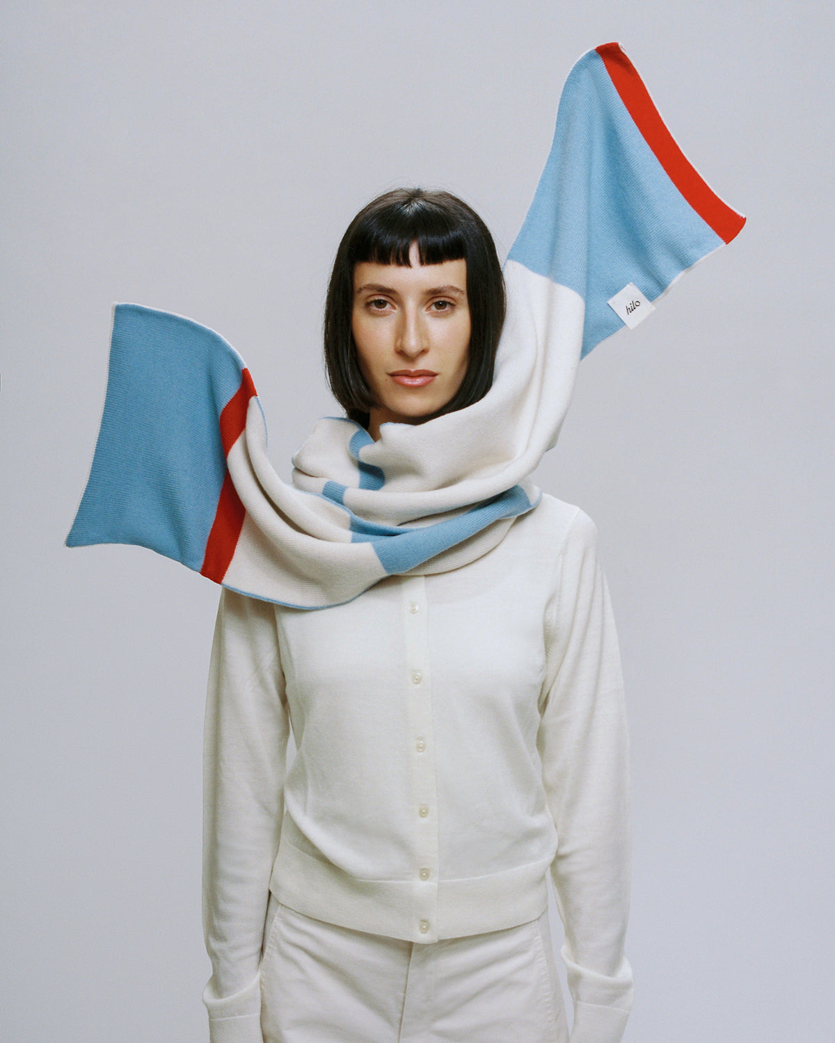Dácil scarf in sky blue, cream and red 100% Merino wool
